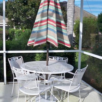Patio table with 4 chairs and umbrella