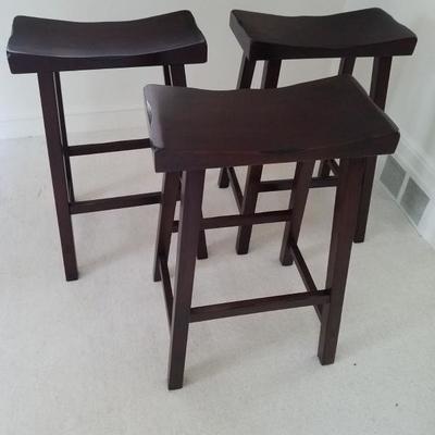 Set of four kitchen stools, only three shown