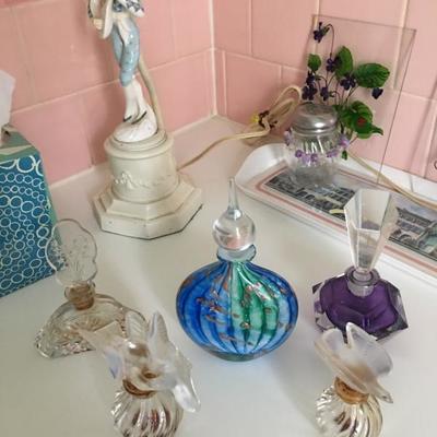 A few of the perfume bottles.  Lalique, Baccarat, others include Hermes, Chanel#5, Shalimar, some never opened and in original boxes