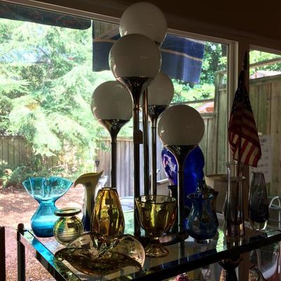 1970s vintage "waterfall" style lamp with collection of art glass.