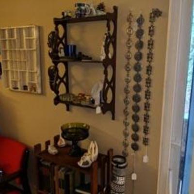 Vintage Knickknack  shelf with miscellaneous collectibles.