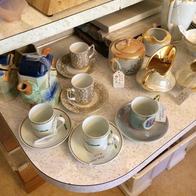 Collection of bone china demitasse cups and saucer's.