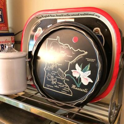 Metal beer trays and souvenir trays.
