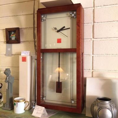  Collection of Frank Loyd Wright reproductions from the early 1990s, including: clock by Bullova, two miniature concrete garden nymphs,...