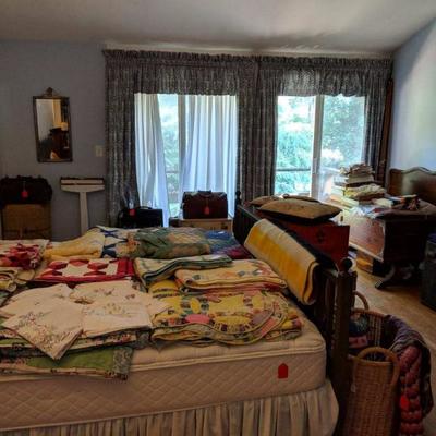 Quilts, bed, scale, mirror.