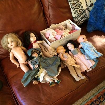 Six antique dolls, including: Madame Alexander dolls Scarlet O'Hara, little red riding hood and Snow white.