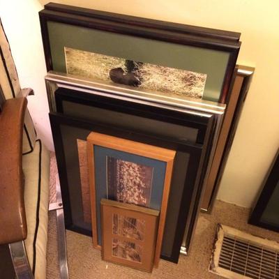 Large selection of framed prints and photographs.