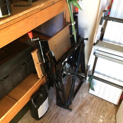 Workmate bench, saw horses, and an adjustable scaffolding.