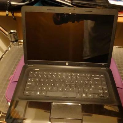 15 HP Laptop with Power cord and Purple Case
