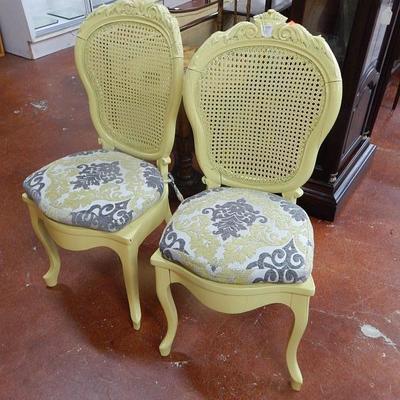 Pair of yellow cane side chairs
