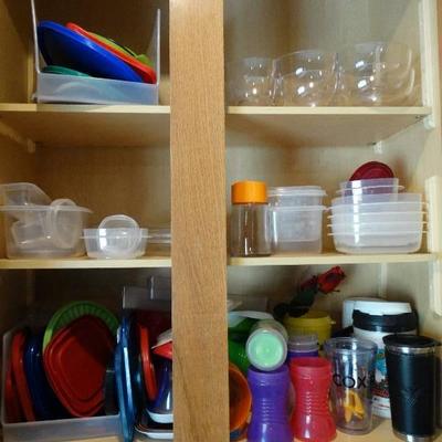 Cabinet full of kitchen ware.