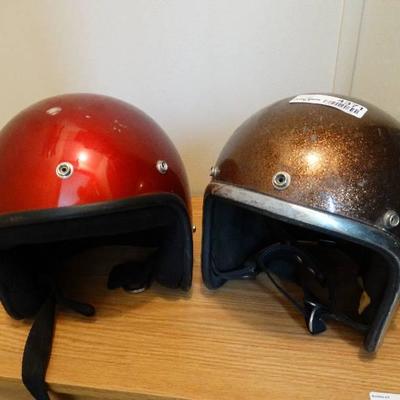 2 VIntage motorcycle helmets.