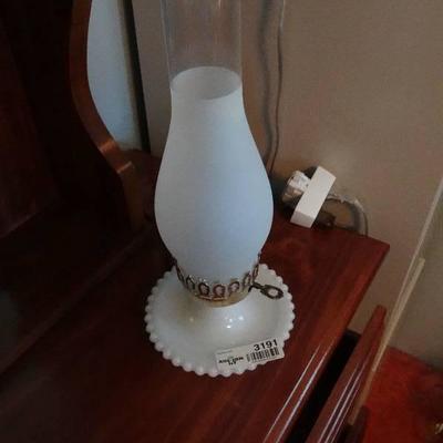 Lamp with glass globe.