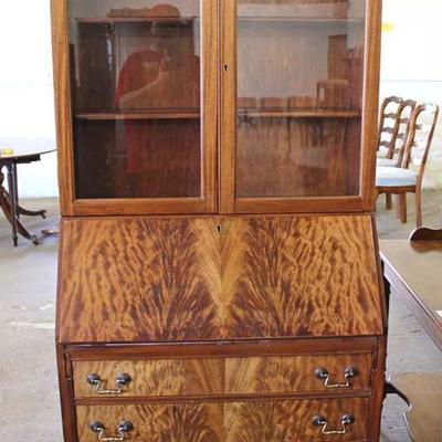  Burl Mahogany Secretary with Bookcase Top

Located Inside â€“ Auction Estimate $100-$300 