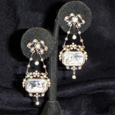 Antique Georgian earrings in silver and gold with natural pearls with original tiny paintings.  Rare.