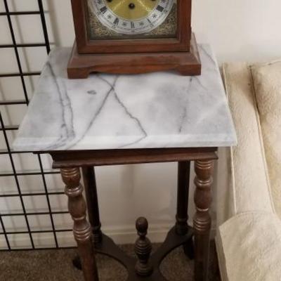 Table sold but the clock is still available. 