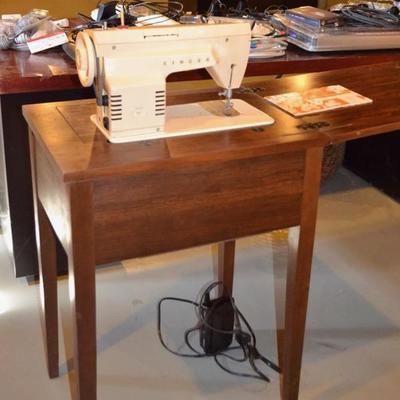 Singer sewing machine with cabinet