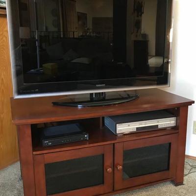 Toshiba Flat Screen TV and cabinet
