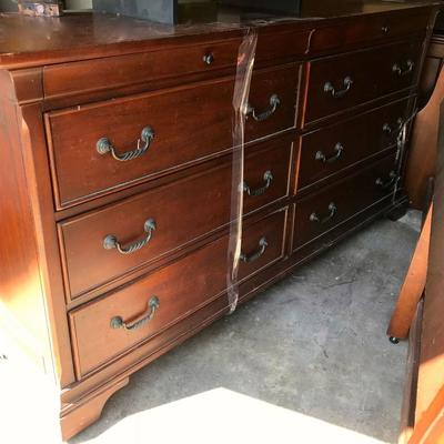 5 Piece King Bedroom Set. King bed with high back board and a footboard, dresser/armoire, 2 night stands
