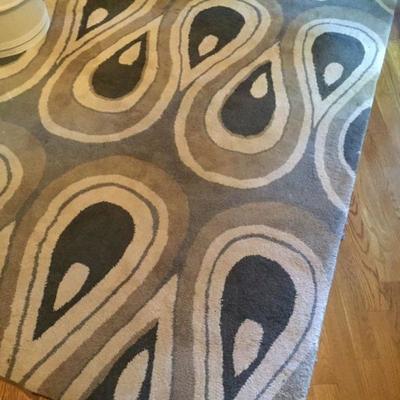 Numerous wool area rugs