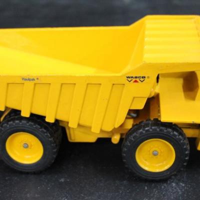 Pair Yellow Construction Dump Trucks