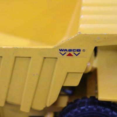 Pair Yellow Construction Dump Trucks