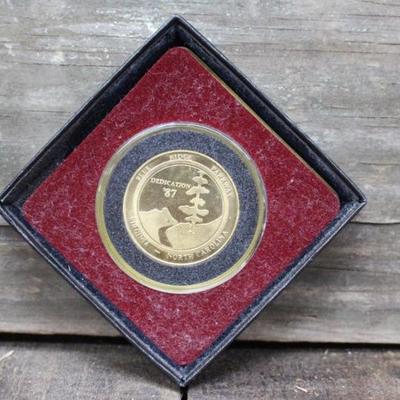 1987 Blue Ridge Parkway Commemorative Coin from when the U.S. government finished the last 7.5 miles of the parkway. Charleston Mint.