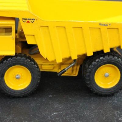 Pair Yellow Construction Dump Trucks