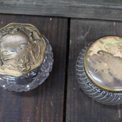 Two Victorian Round Molded Glass Face Powder Jars w/ Decorative Lids