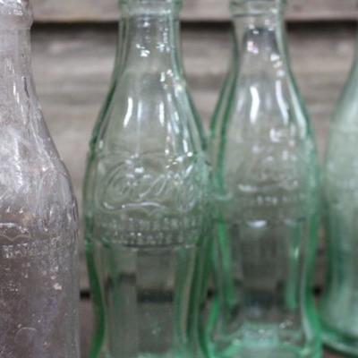 Collection of 5 Soft Drink Bottles