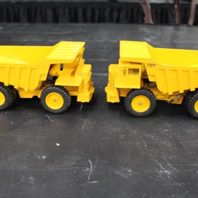 Pair Yellow Construction Dump Trucks