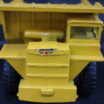 Pair Yellow Construction Dump Trucks