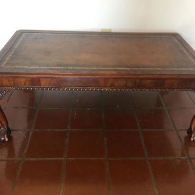 Vintage coffee table with leather inlay