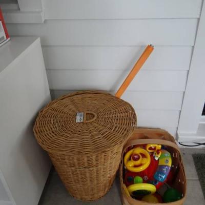 Basket with lid and toys and small basket with toy ...