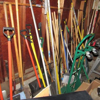 lots of yard tools and gardening items
