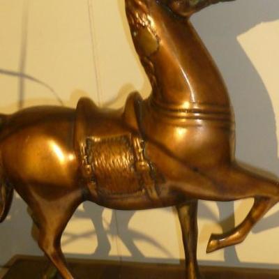 Bronze horse on plynth.