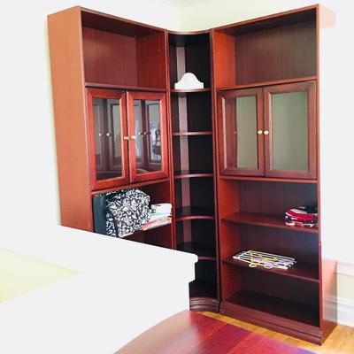 1 of 4 piece Dark Cherry Wood Office Set:
L shaped library with glass doors
