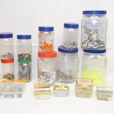 Lot of miscellaneous hardware sorted into jars an ...