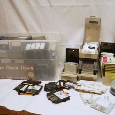 Big lot of floppy disks and storage cases-see phot ...