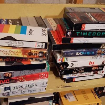 Lot of VHS Movies (shelf not included) see pics fo ...