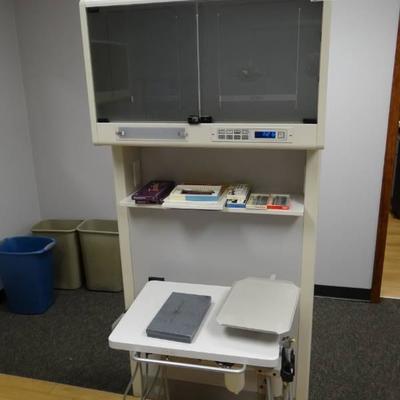 A Dec Double Sided Stand and Pull Out Work Station.