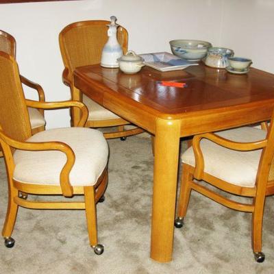 oak table and chairs with casters  BUY IT NOW  $ 225.00