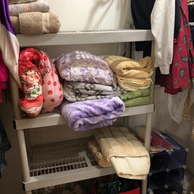 Tons of blankets - new towels - used towels - 
New winter wear 