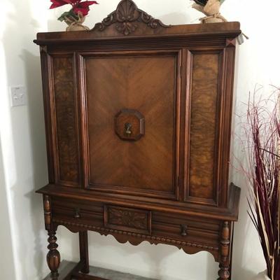 Antique Mexican cabinet and we have a matching dining room and Buffett 