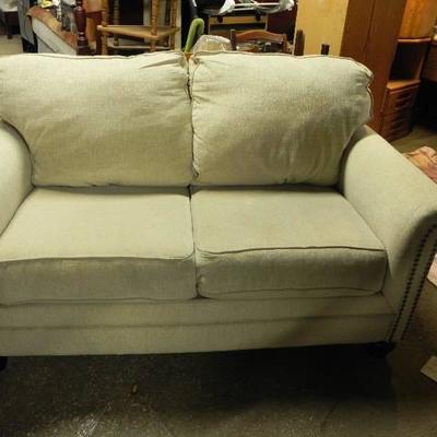 Awesome looking tannish love seat