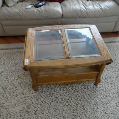 Coffee table glass top sides fold down has one dra