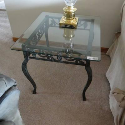 Glass top side table with metal base