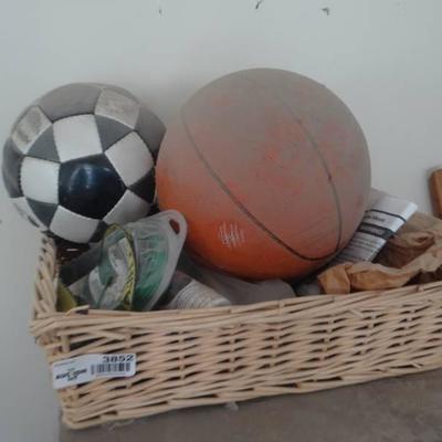 Basket w basket ball, soccer ball & misc.