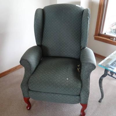 Reclining wing back chair.