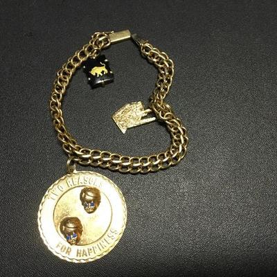 14k gold bracelet & charms